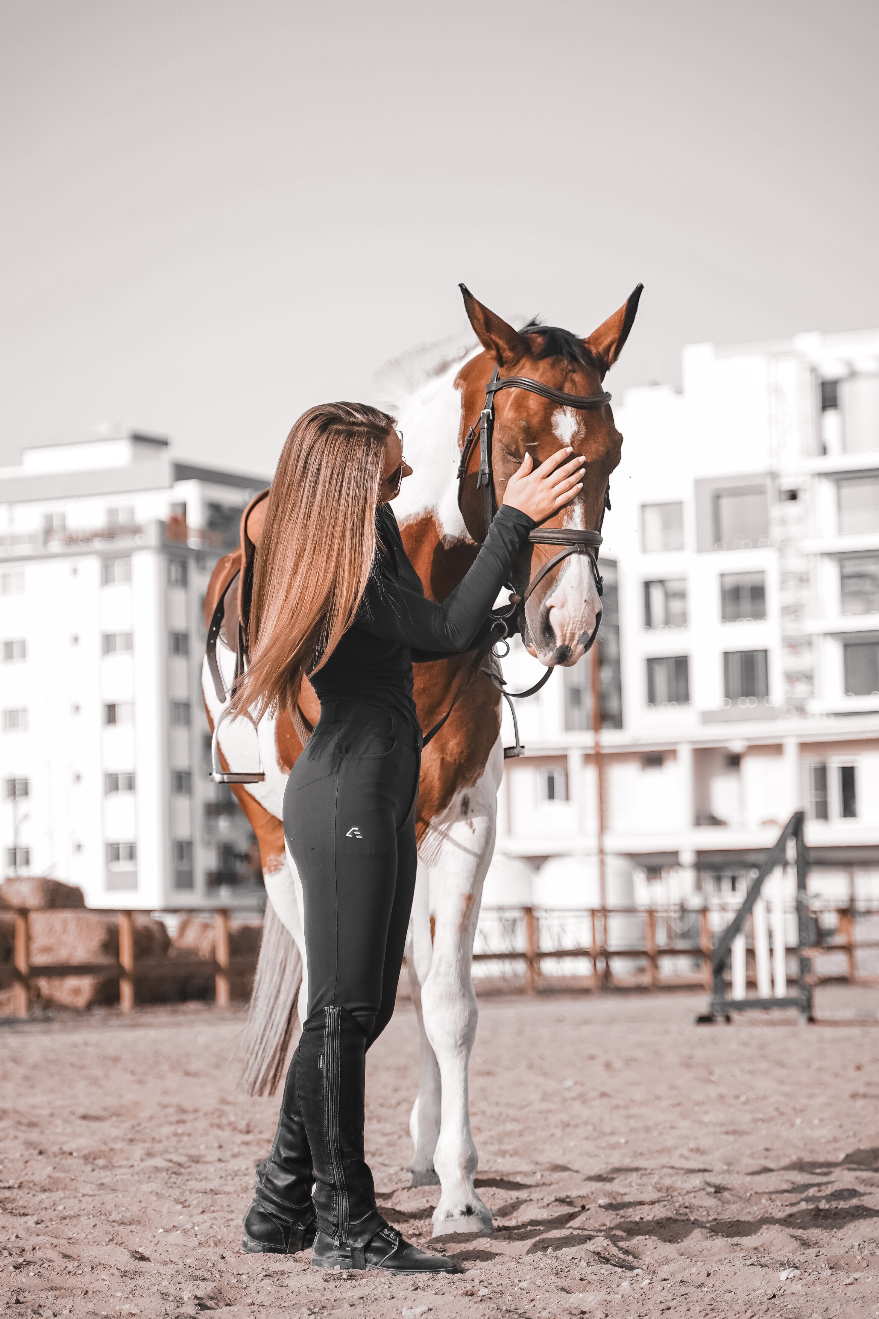 Anna sharing a quiet moment with a horse